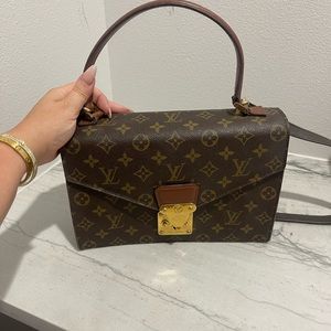 Louis Vuitton satchel with off brand strap